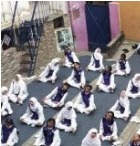 Students practising yoga